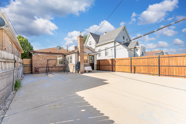 5322 West Addison Street Chicago, IL 60641 - Photo 18 of 21 a view of a house with a flat outdoor space