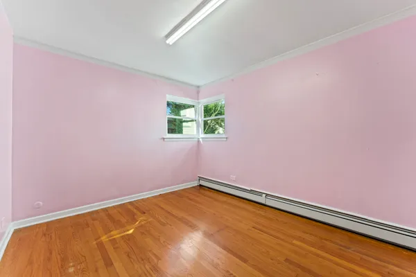 a view of a room with a large window