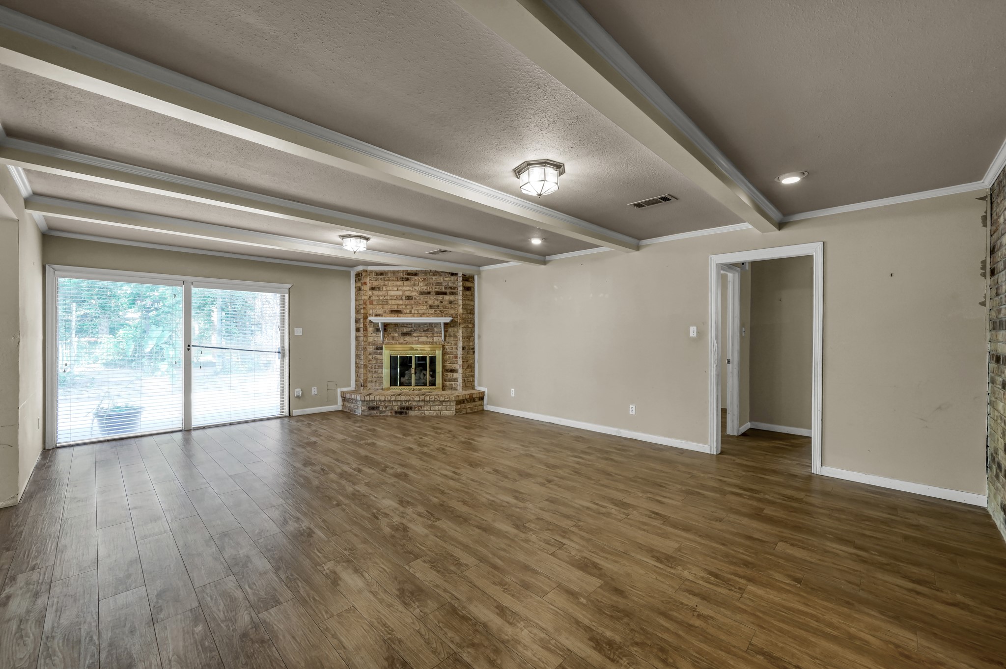 2207 Arendale Lane Spring, TX 77386 - Photo 15 of 30 Fireplace featured in the main living area.