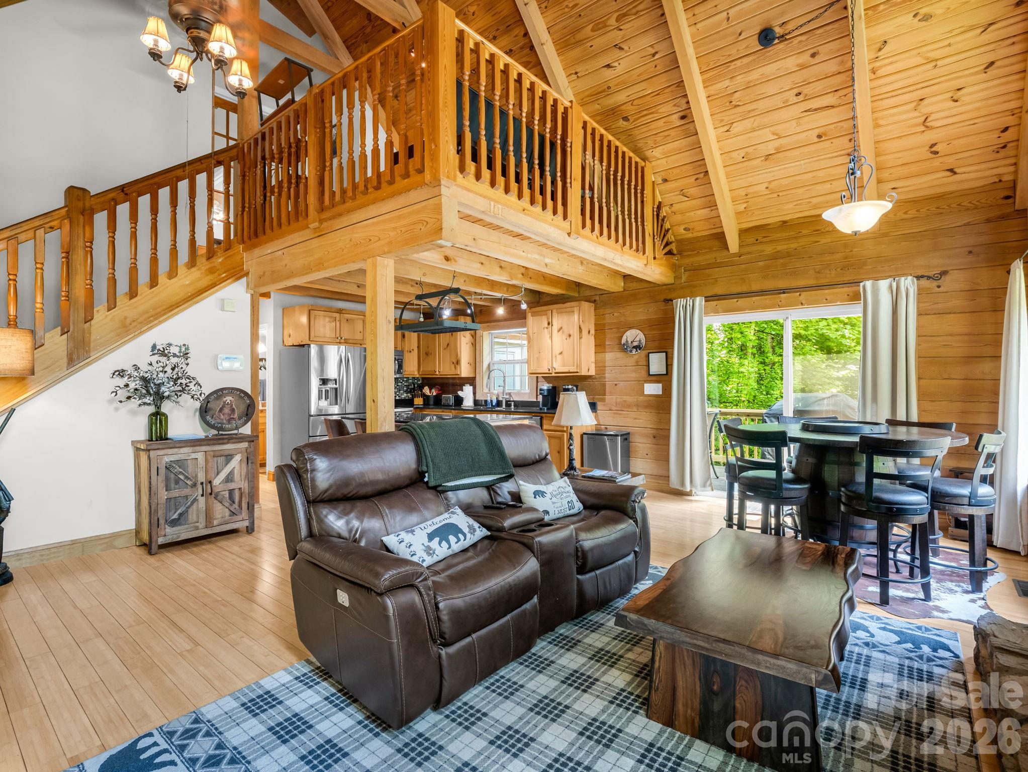165 Dream Road Hendersonville, NC 28792 - Photo 11 of 46 a living room with furniture and a dining table