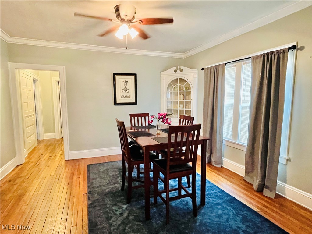 2176 Rexwood Road Cleveland, OH 44118 - Photo 4 of 45 Formal Dining Room with Built-in China Cabinet (Built-in Linen Closet/Drawers to the Left), Ceiling Fan and Gorgeous Hardwood Floors, Neutral Wall Color ~