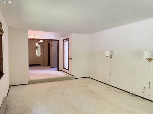 a view of a room with an empty space