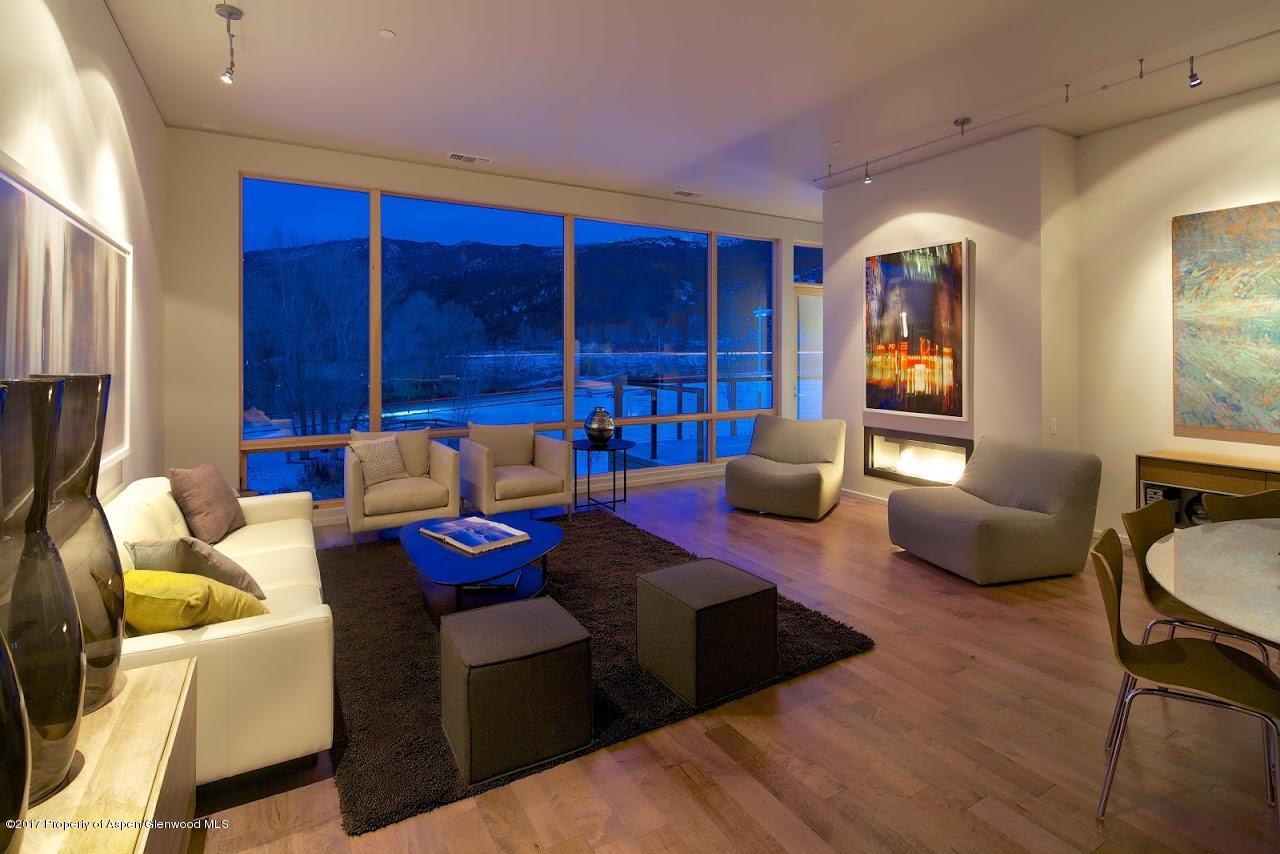 102 Evans Road, Unit 107 Basalt, CO 81621 - Photo 2 of 62 a living room with furniture and wooden floor