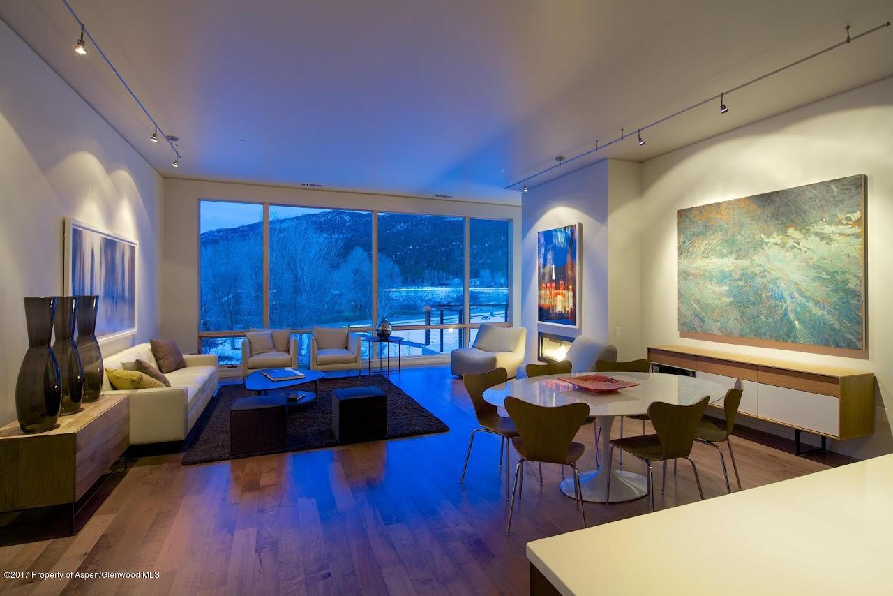 102 Evans Road, Unit 107 Basalt, CO 81621 - Photo 3 of 62 a living room with furniture and wooden floor