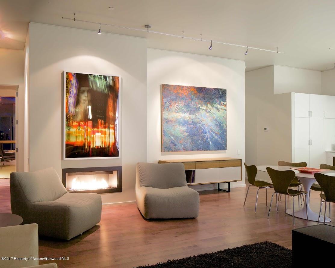 102 Evans Road, Unit 107 Basalt, CO 81621 - Photo 4 of 62 a living room with furniture and a large window