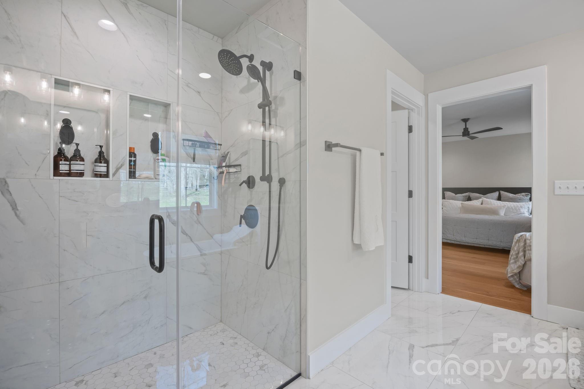 234 Gravely Branch Road Fletcher, NC 28732 - Photo 22 of 46 a bathroom with a shower