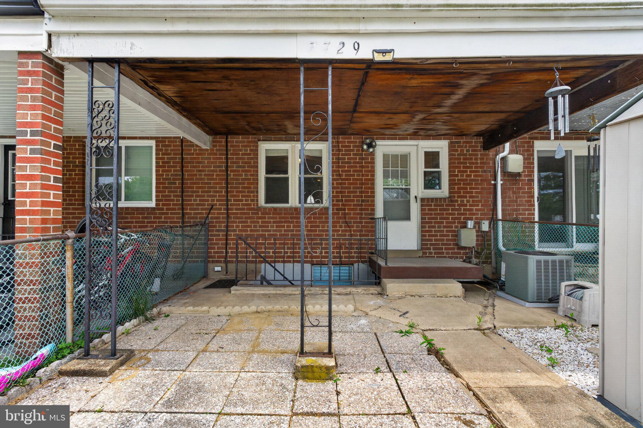 7729 Charlesmont Road Baltimore, MD 21222 - Photo 18 of 38 Charming entryway with covered porch.