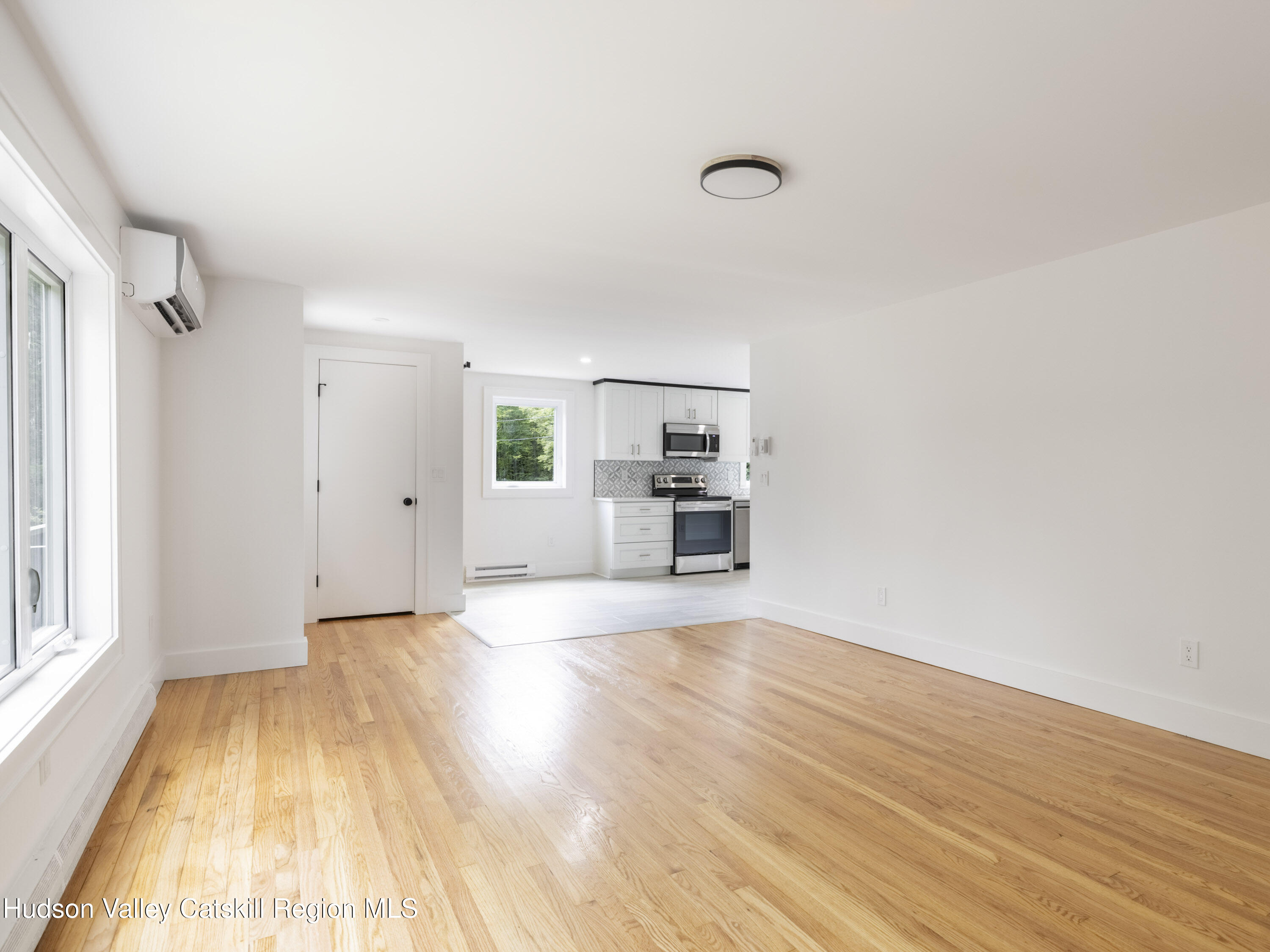 14 Goat Hill Road Saugerties, NY 12477 - Photo 19 of 26 a view of empty room with wooden floor and window