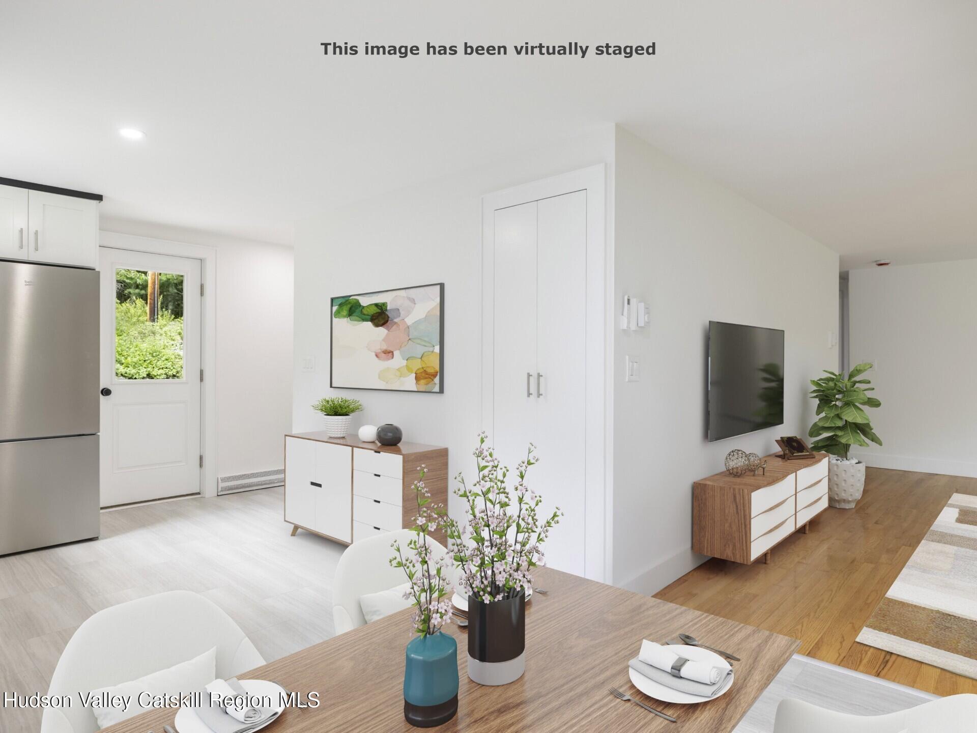 14 Goat Hill Road Saugerties, NY 12477 - Photo 6 of 26 a living room with furniture and a couch