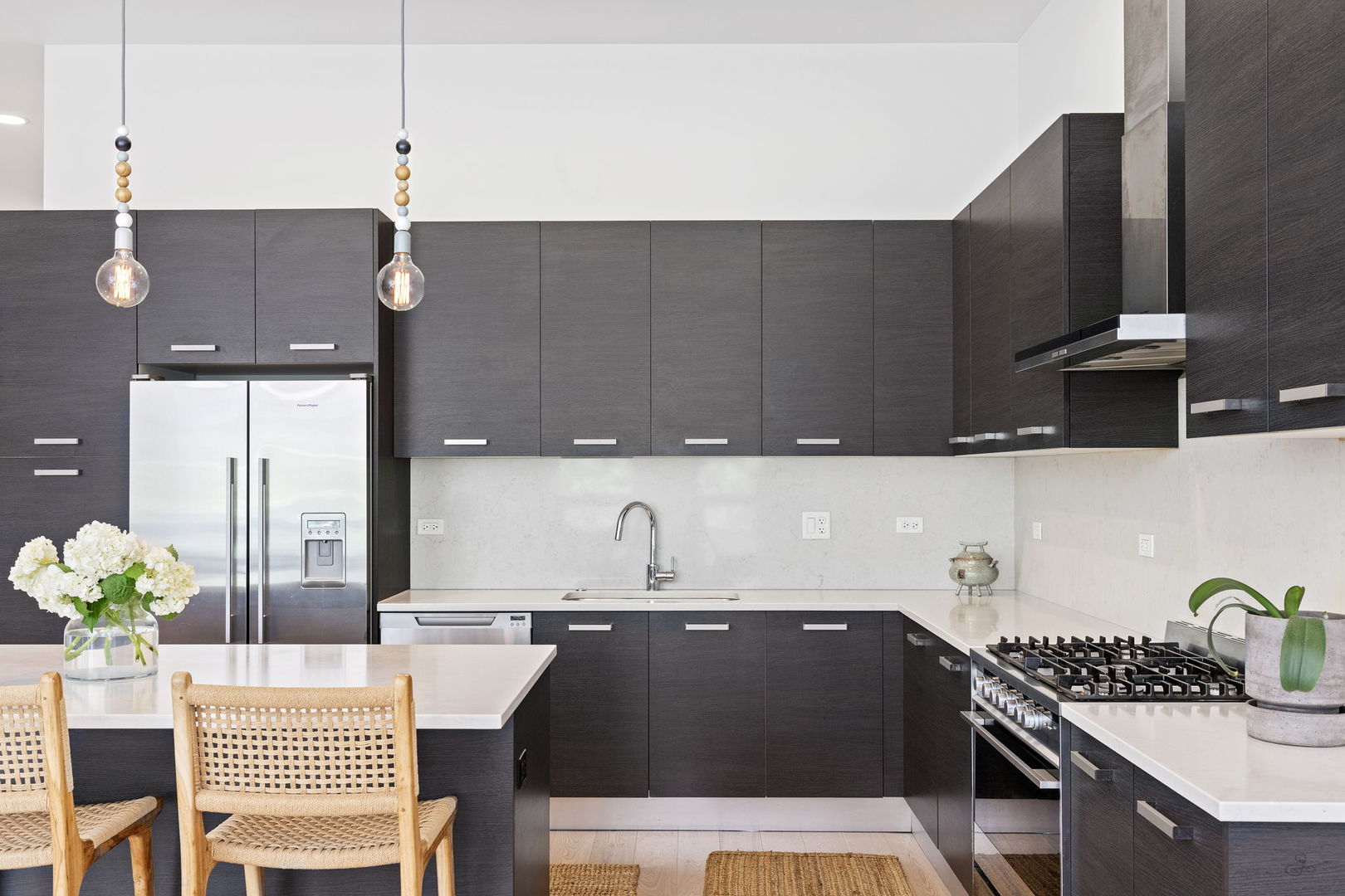 128 South Aberdeen Street, Unit 2N Chicago, IL 60607 - Photo 11 of 31 a kitchen with a sink and cabinets