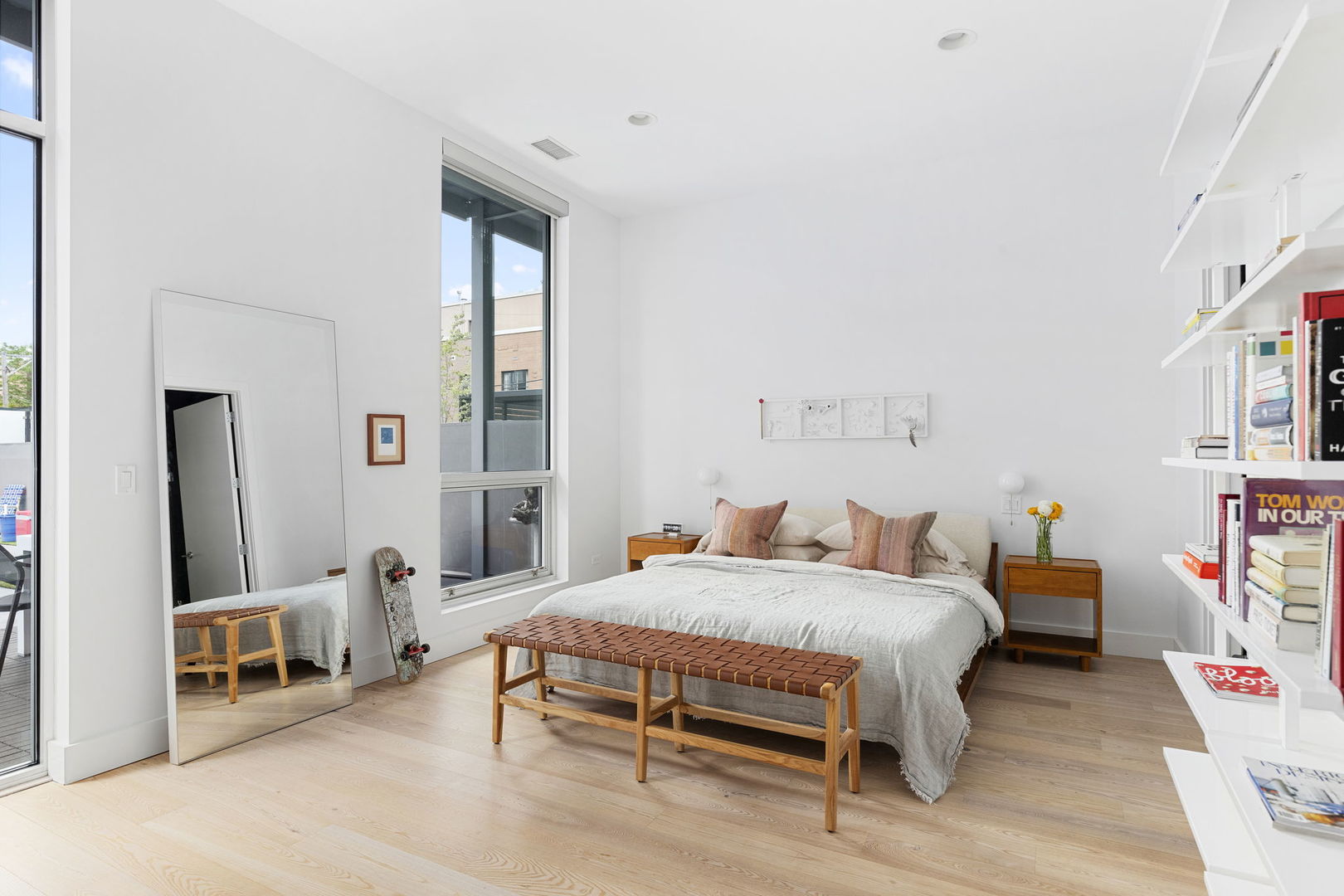 128 South Aberdeen Street, Unit 2N Chicago, IL 60607 - Photo 15 of 31 a bedroom with a bed and a table in it