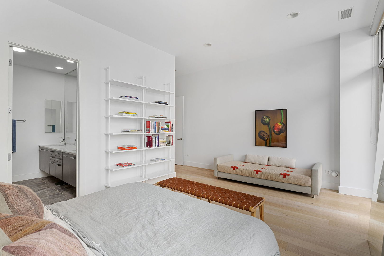 128 South Aberdeen Street, Unit 2N Chicago, IL 60607 - Photo 16 of 31 a bedroom with a bed and a view of kitchen