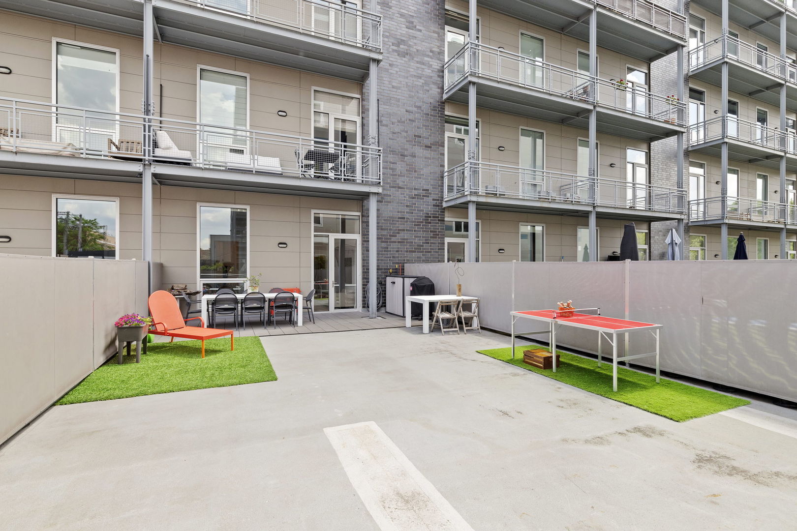 128 South Aberdeen Street, Unit 2N Chicago, IL 60607 - Photo 25 of 31 a front view of a house with a yard and a garage