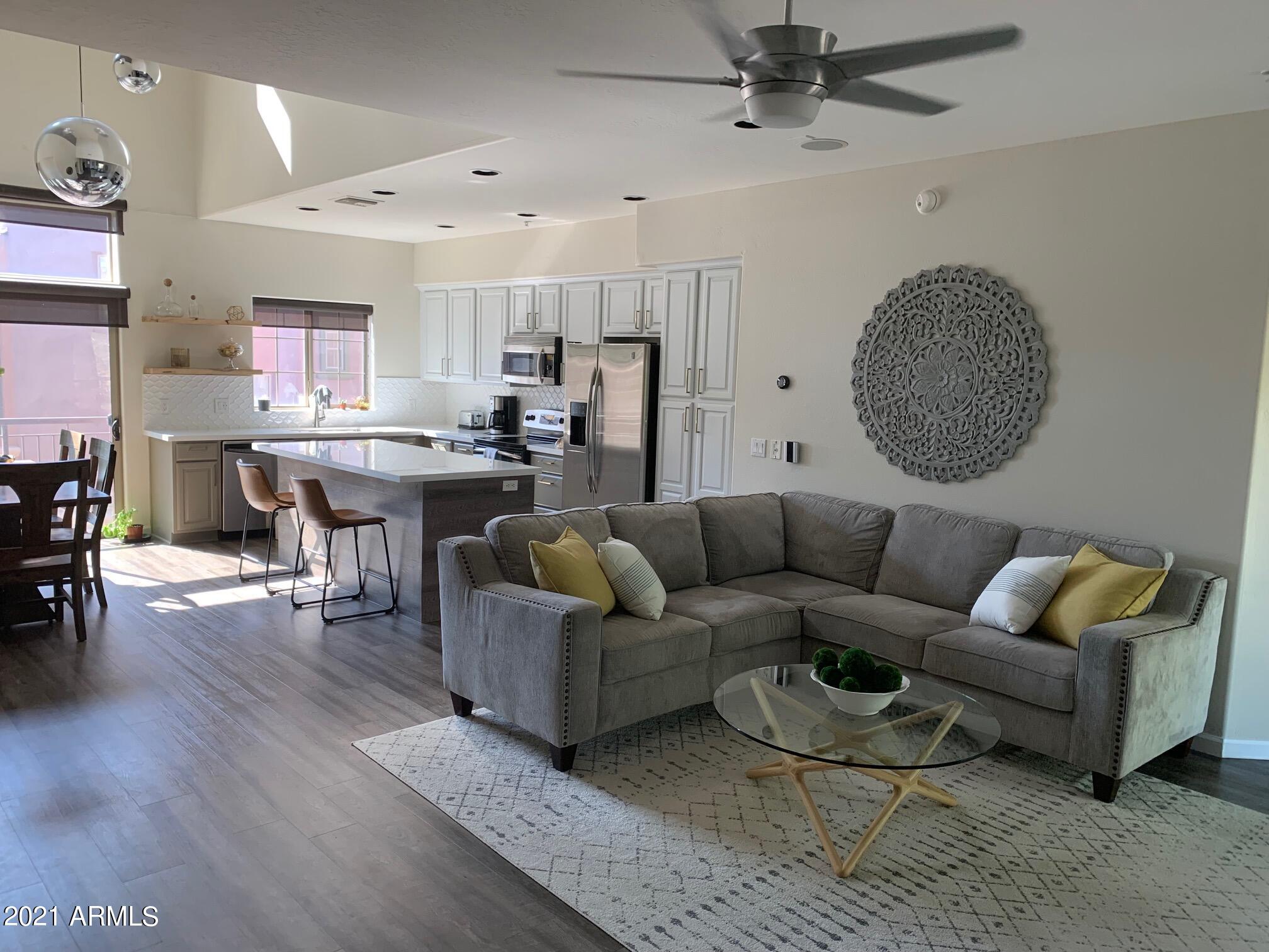 3935 East Rough Rider Road, Unit 1005 Phoenix, AZ 85050 - Photo 1 of 60 Great Room & Kitchen