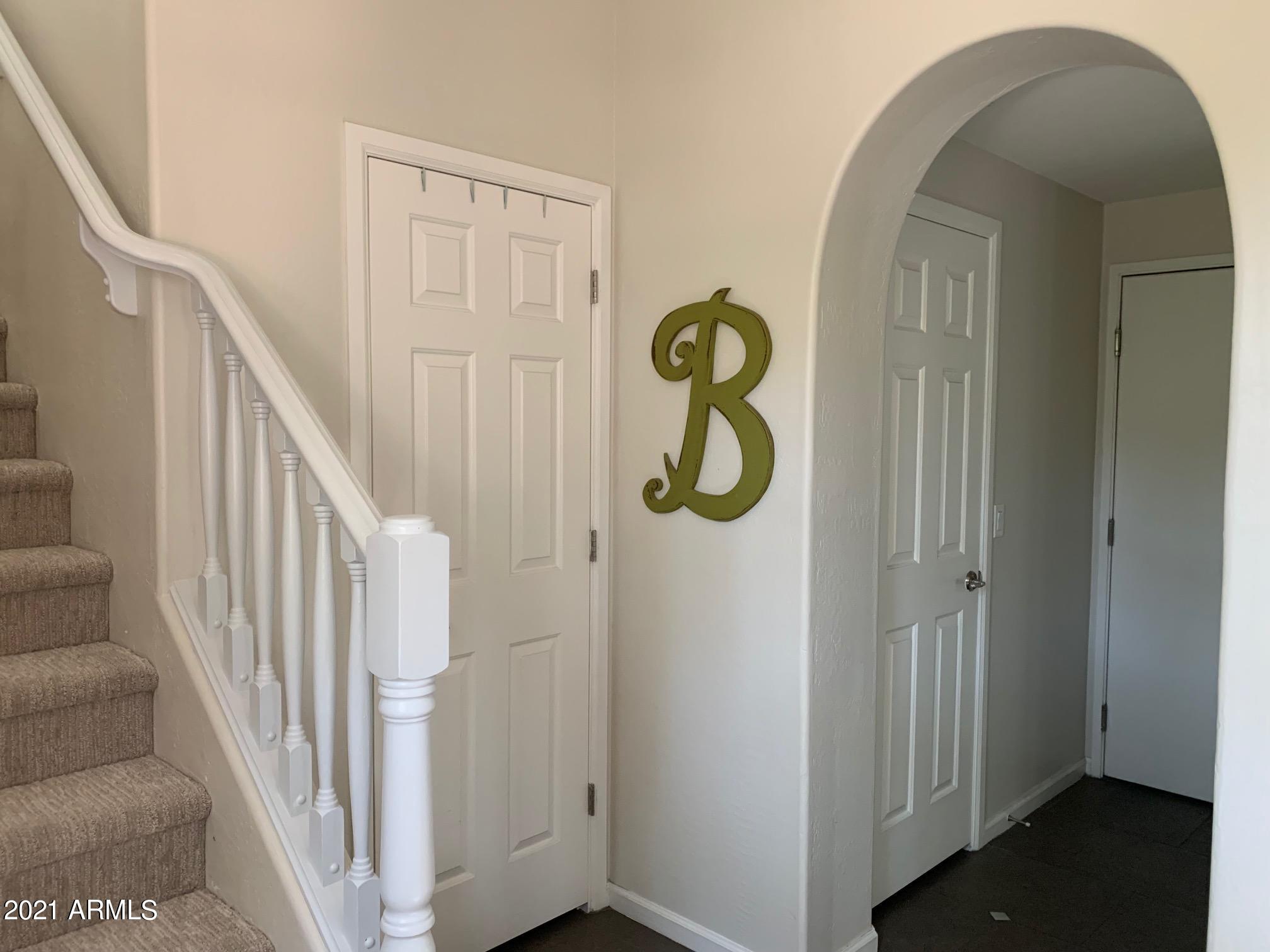 3935 East Rough Rider Road, Unit 1005 Phoenix, AZ 85050 - Photo 33 of 60 1st Floor Entryway #1