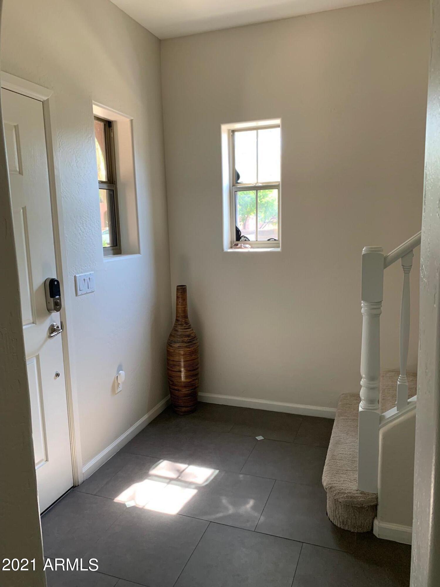 3935 East Rough Rider Road, Unit 1005 Phoenix, AZ 85050 - Photo 34 of 60 1st Floor Entryway #2
