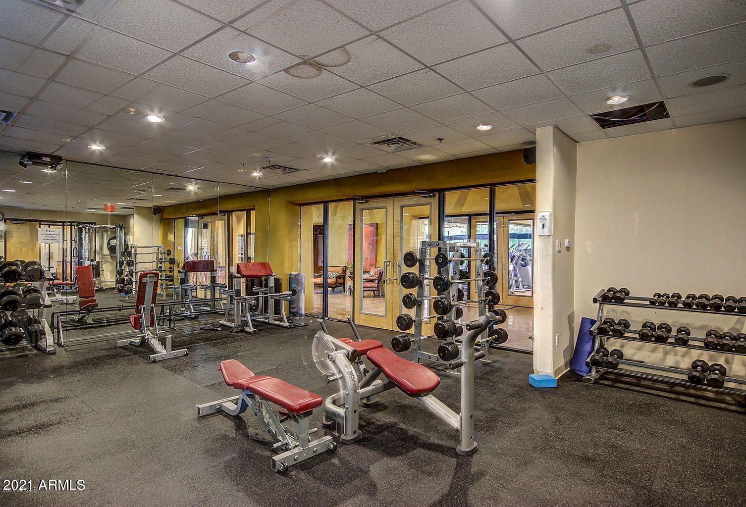 3935 East Rough Rider Road, Unit 1005 Phoenix, AZ 85050 - Photo 50 of 60 Clubhouse Fitness Room