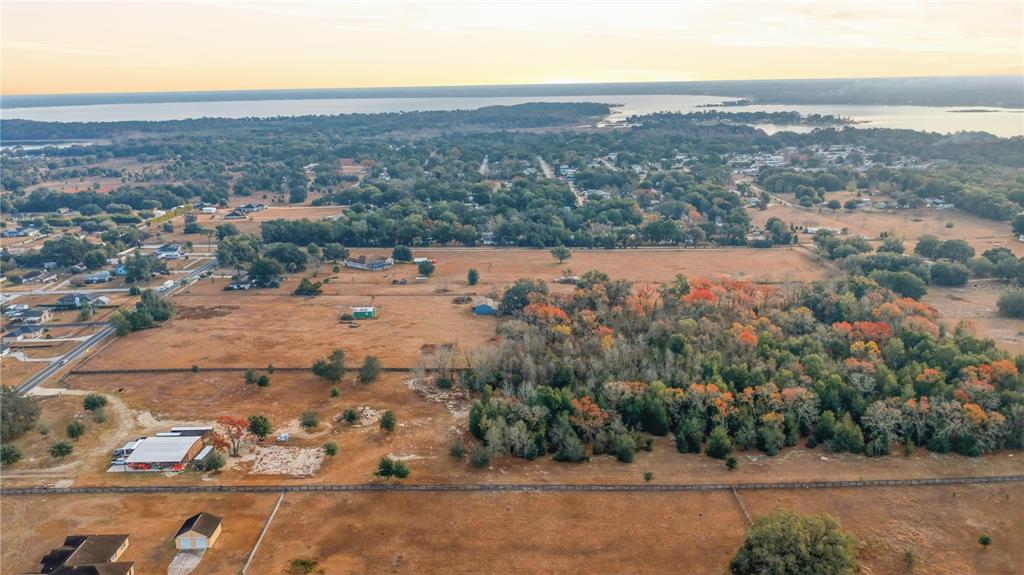 9900 Southeast Sunset Harbor Road Summerfield, FL 34491 - Photo 36 of 44 an aerial view of multiple house