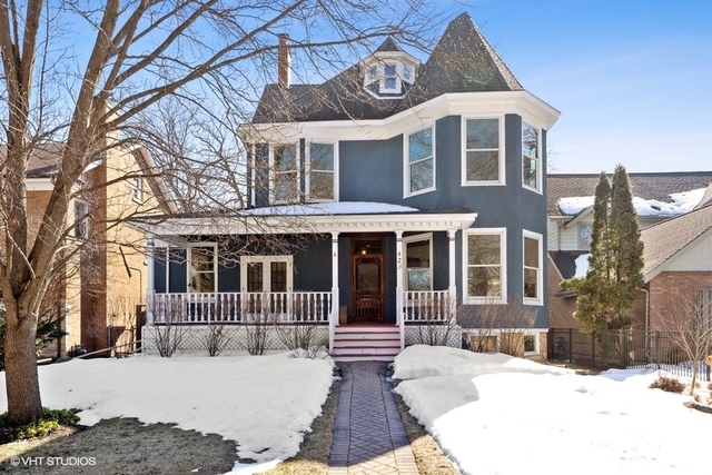 423 Central Avenue Wilmette, IL 60091 - Photo 1 of 5 a view of a house with a yard