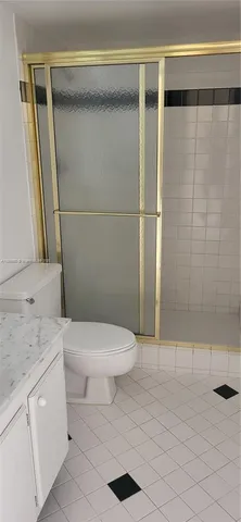 a view of a refrigerator in kitchen
