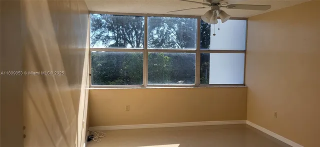 a bathroom with a toilet and a bathtub