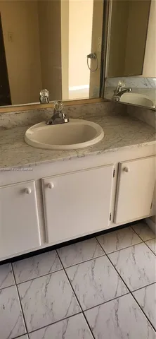 an empty room with wooden door