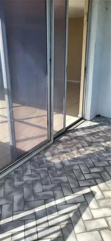 a bathroom with a toilet a sink and shower