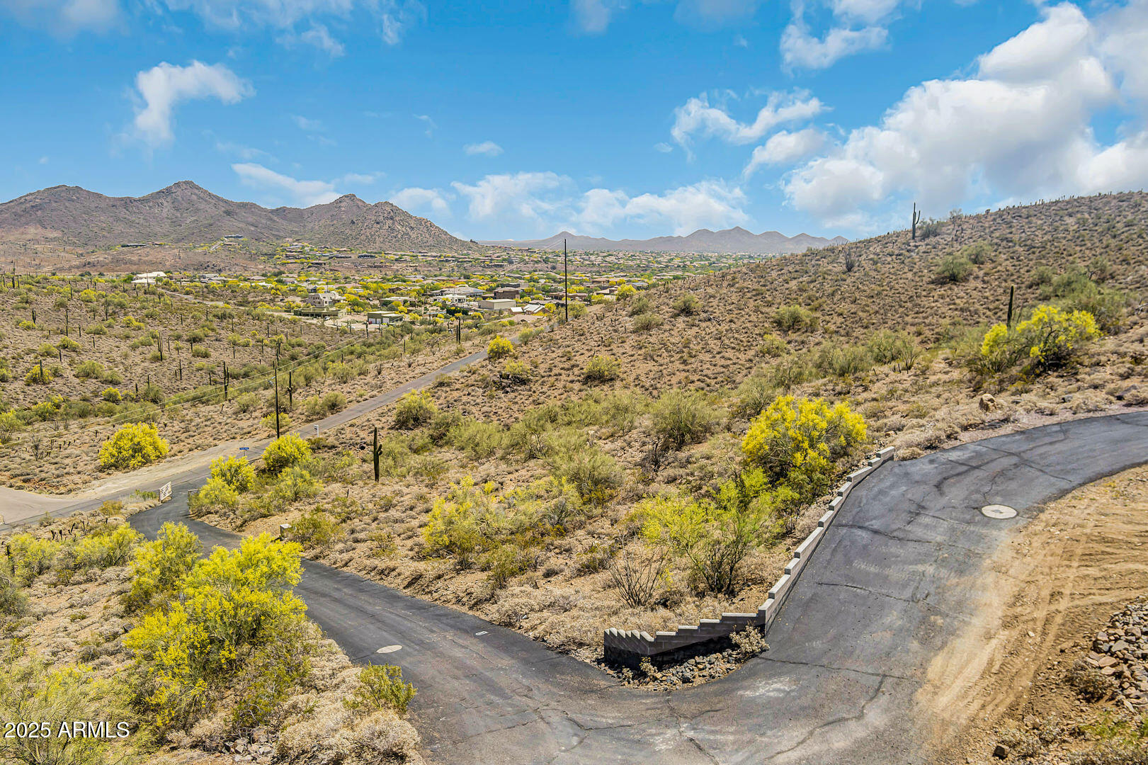 3303 West Rambling Road Prescott, AZ 86305 - Photo 1 of 12 a view of a mountain with a mountain in the background