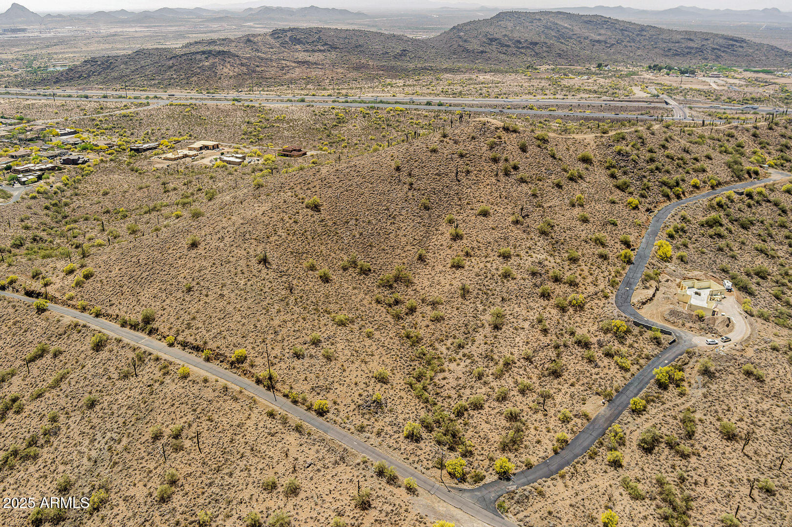 3303 West Rambling Road Prescott, AZ 86305 - Photo 9 of 12 a view of a lake with mountain view