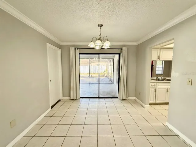 a view of empty room with windows