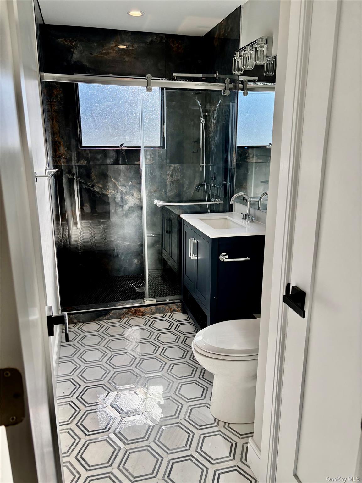 188 Sequams Lane Centre West Islip, NY 11795 - Photo 15 of 27 a bathroom with a sink toilet and shower