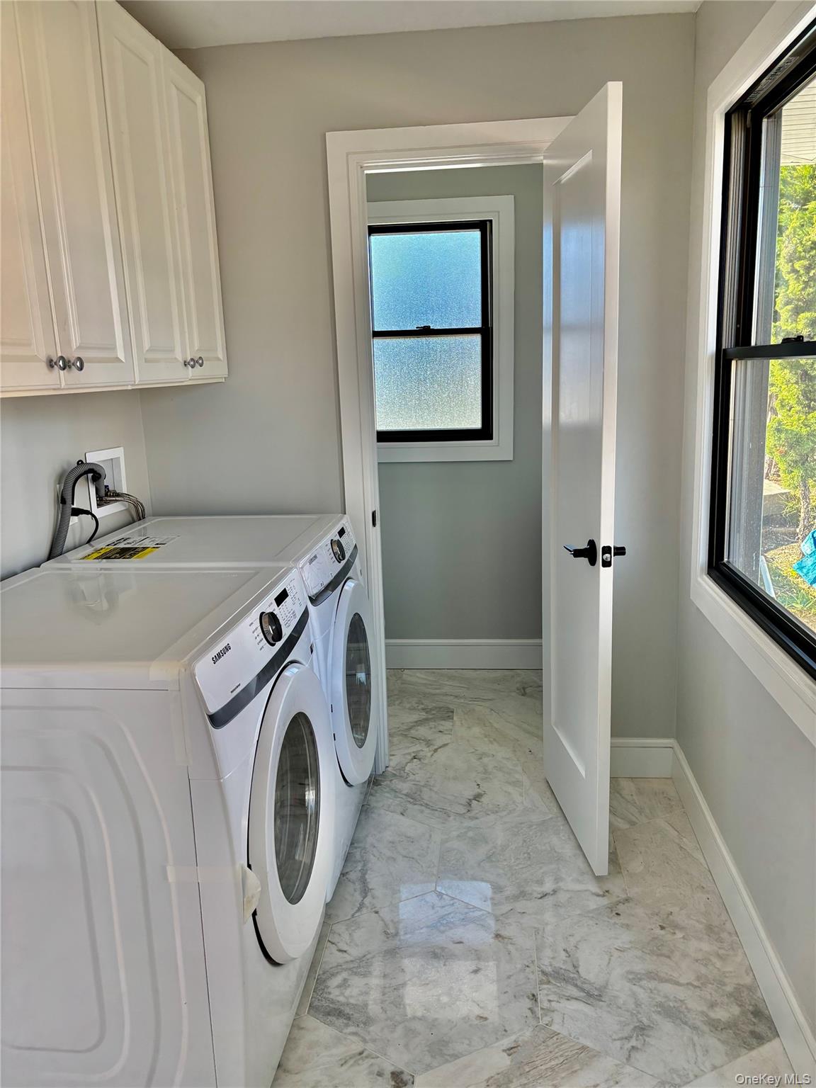 188 Sequams Lane Centre West Islip, NY 11795 - Photo 8 of 27 a utility room with dryer and washer