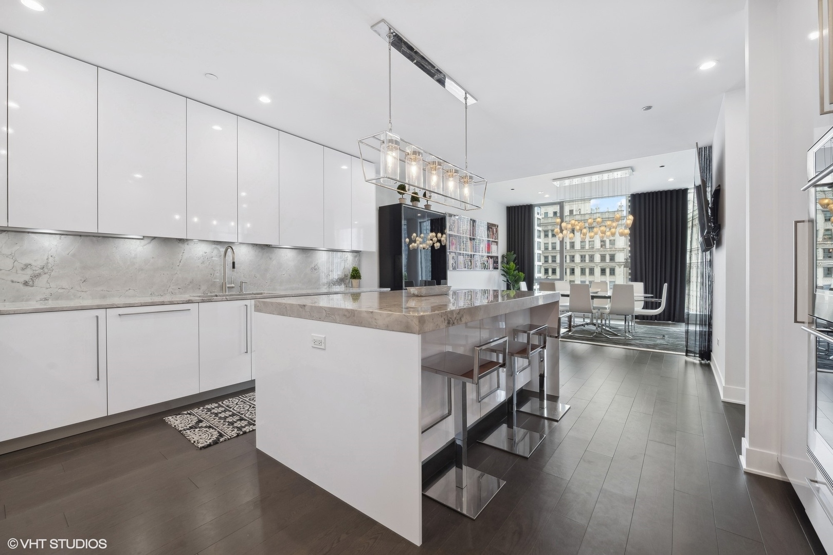 403 North Wabash Avenue, Unit 14A Chicago, IL 60611 - Photo 12 of 49 a kitchen with a sink cabinets and window