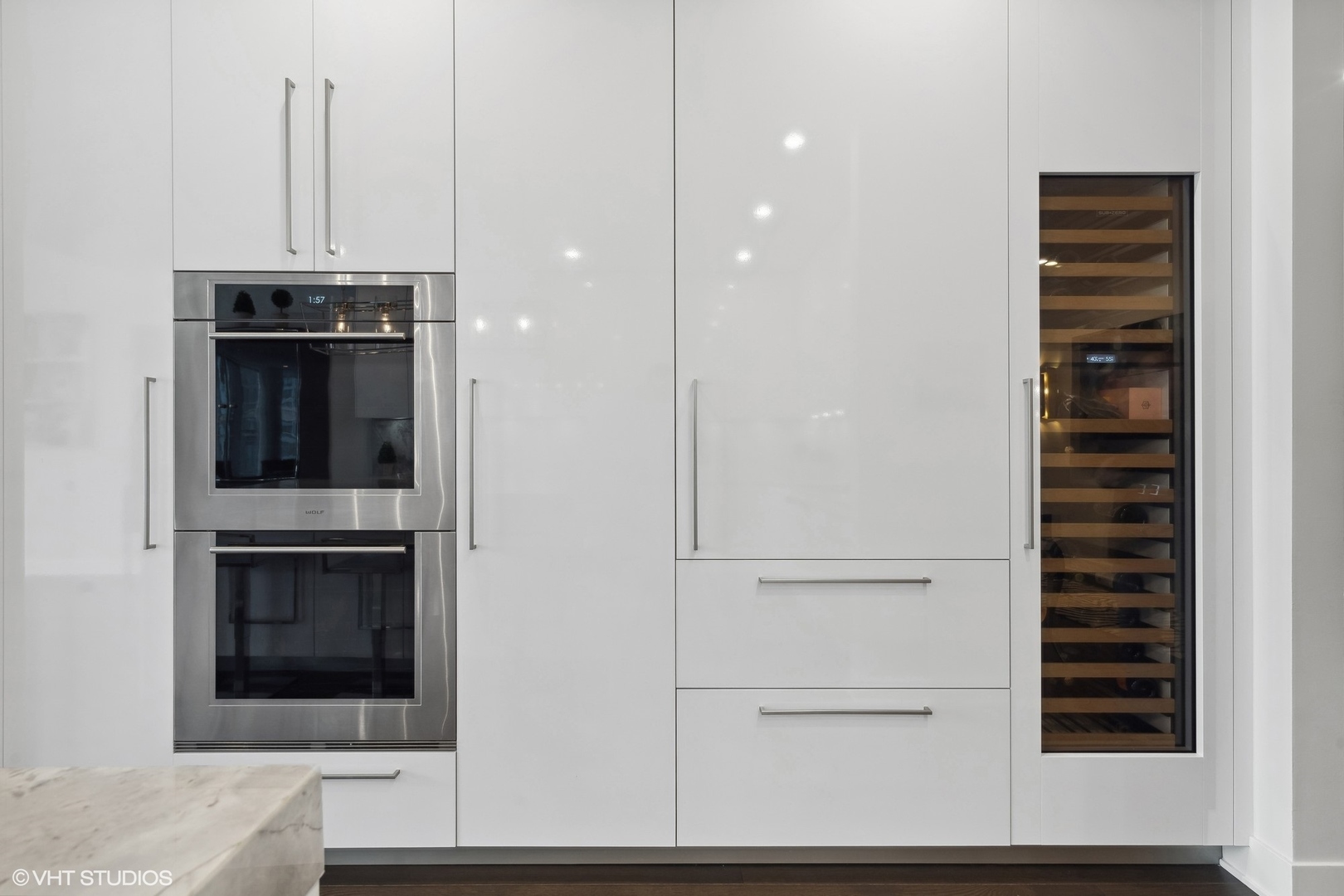 403 North Wabash Avenue, Unit 14A Chicago, IL 60611 - Photo 13 of 49 a view of a hallway with wooden floor and cabinet