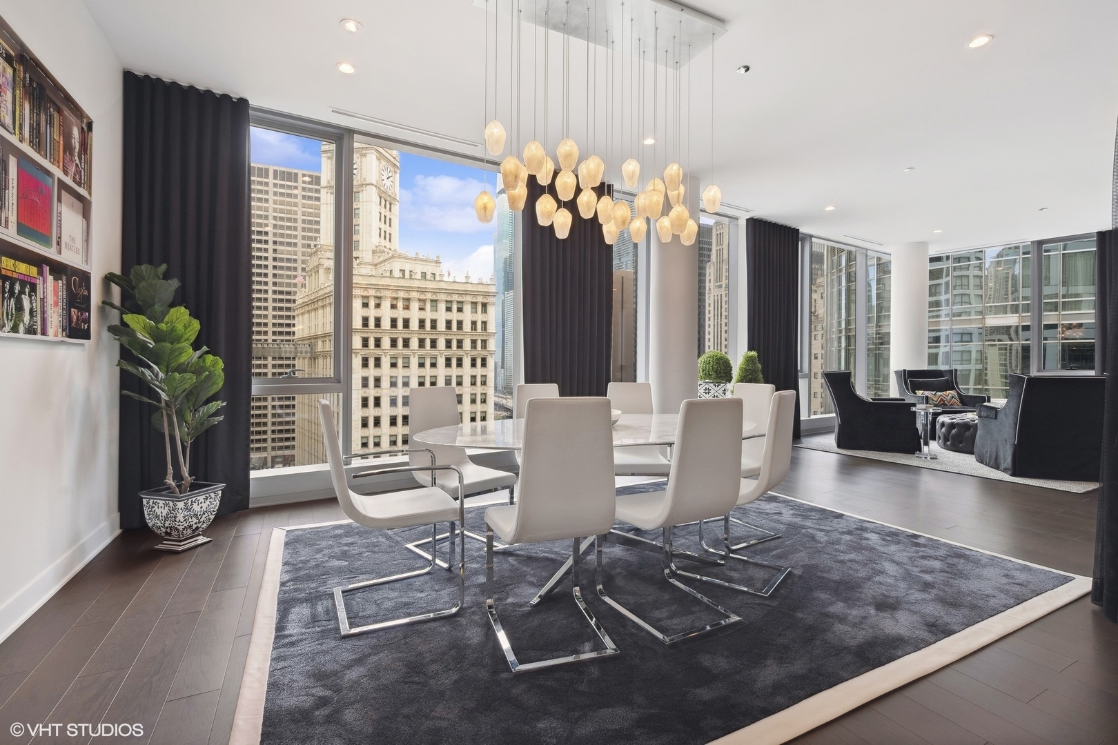 403 North Wabash Avenue, Unit 14A Chicago, IL 60611 - Photo 2 of 49 a view of a dining room with furniture window and wooden floor