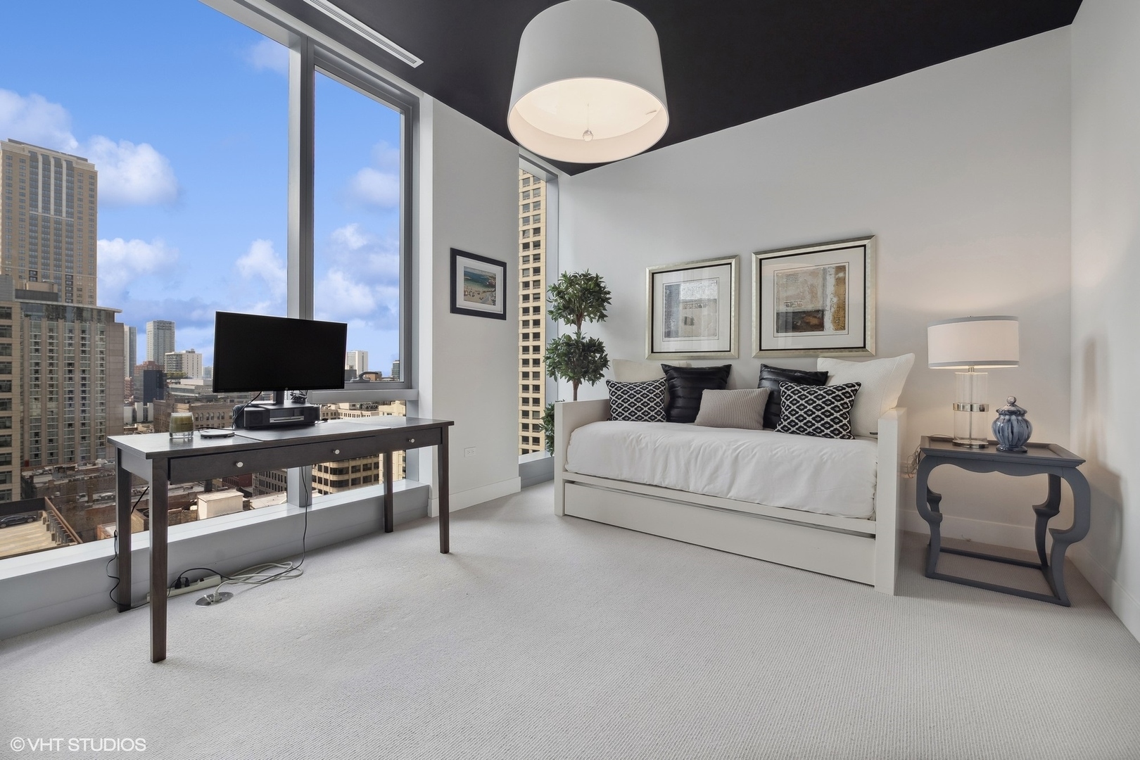 403 North Wabash Avenue, Unit 14A Chicago, IL 60611 - Photo 22 of 49 a living room with furniture and a flat screen tv