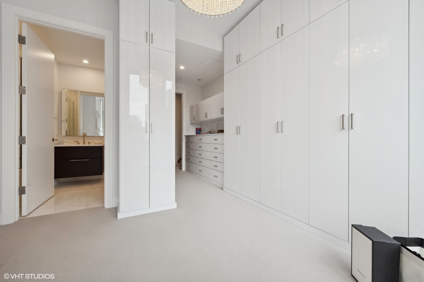 403 North Wabash Avenue, Unit 14A Chicago, IL 60611 - Photo 24 of 49 a view of a hallway with wooden cabinets