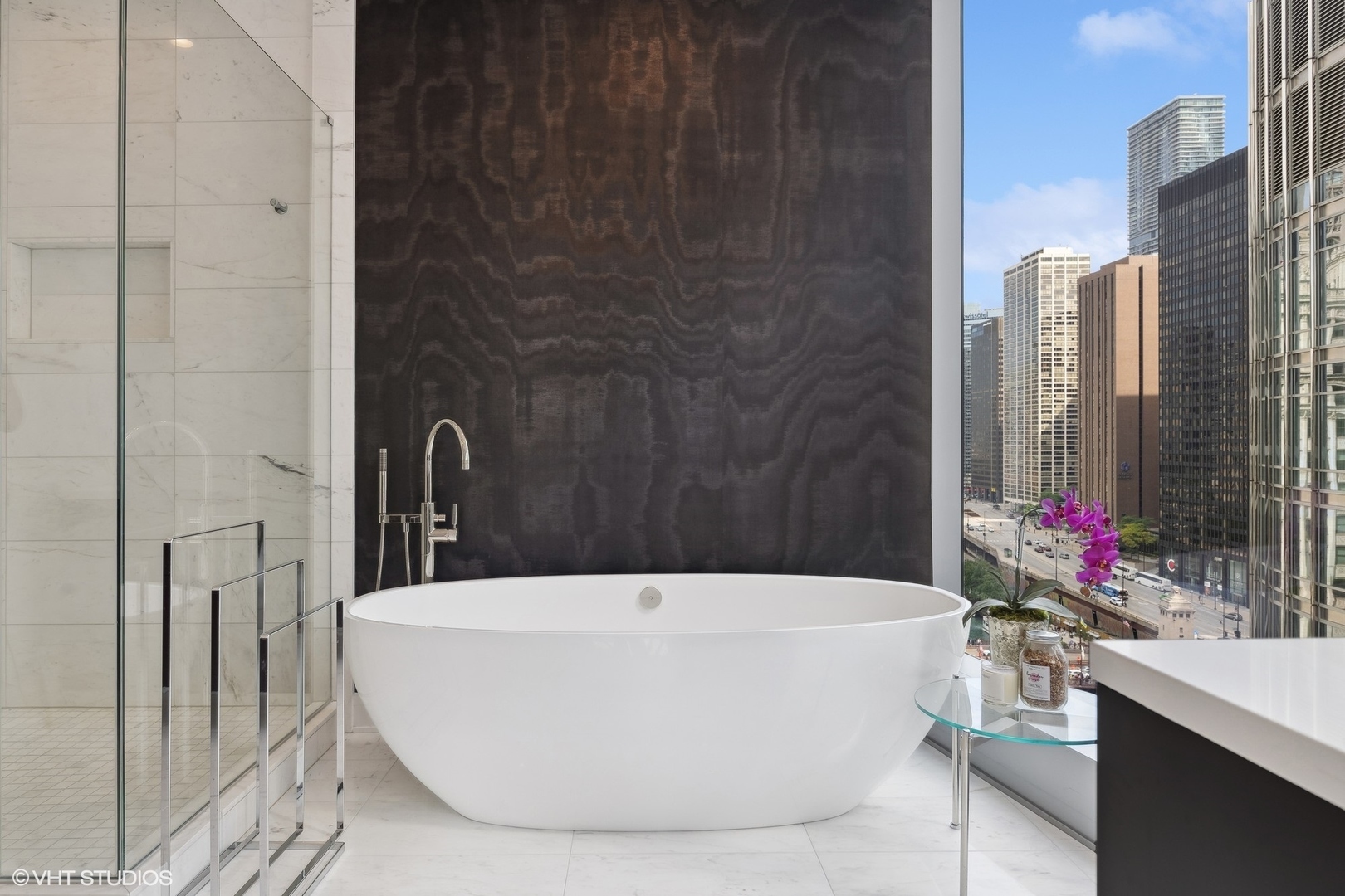 403 North Wabash Avenue, Unit 14A Chicago, IL 60611 - Photo 31 of 49 a white bath tub sitting next to a white sink