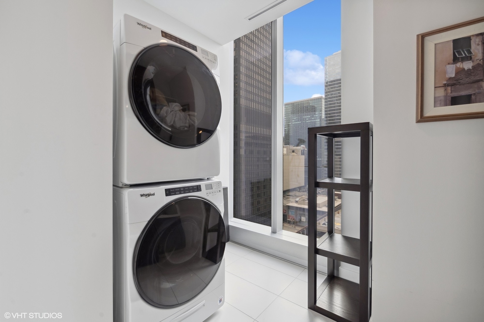 403 North Wabash Avenue, Unit 14A Chicago, IL 60611 - Photo 38 of 49 a view of a hallway with washer and dryer