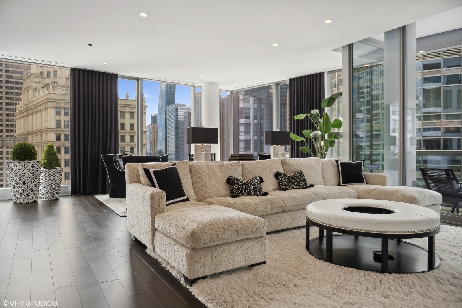 403 North Wabash Avenue, Unit 14A Chicago, IL 60611 - Photo 4 of 49 a living room with furniture and a large window