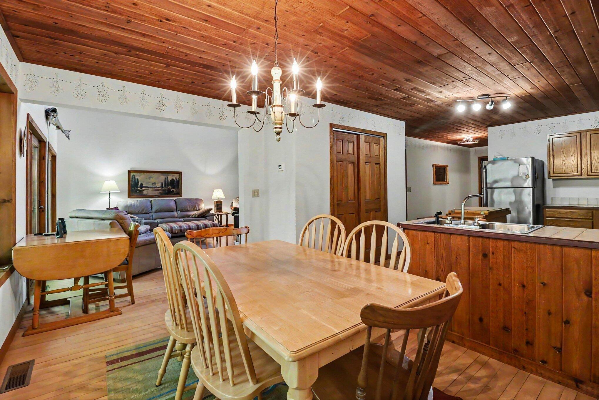780 East Conrad Road Scottville, MI 49454 - Photo 7 of 34 Dining area open to kitchen