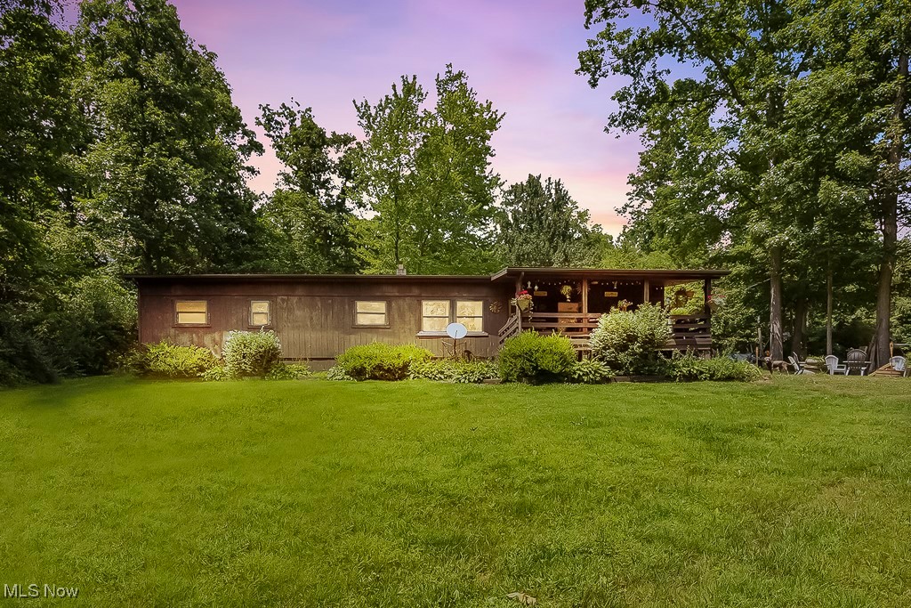 3271 Gorge Road Southwest Dellroy, OH 44620 - Photo 1 of 48 Back house at dusk with a yard