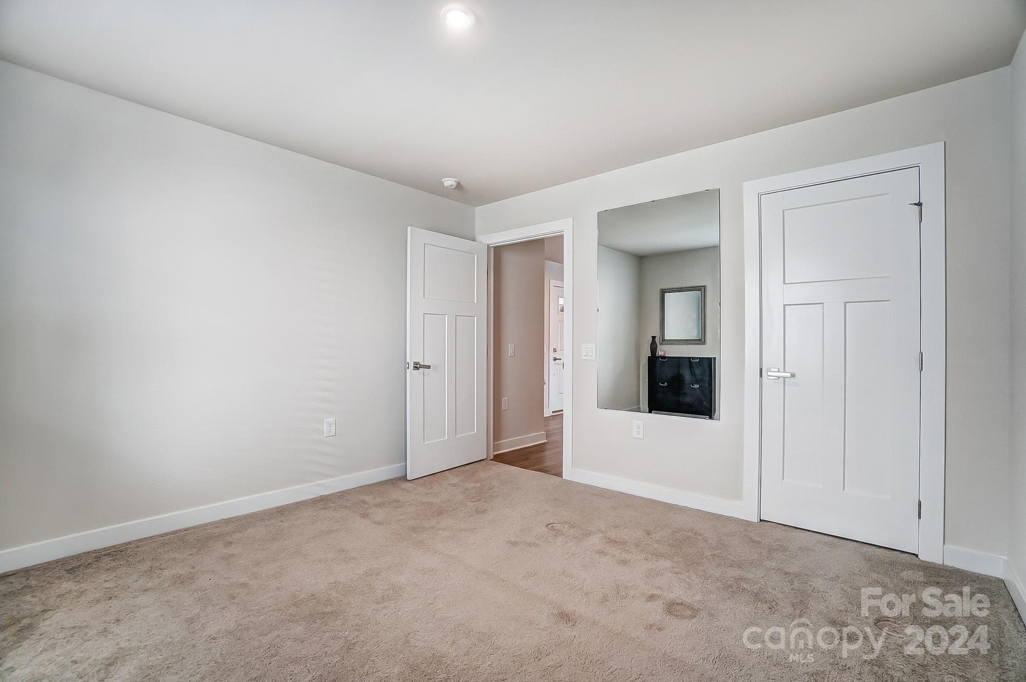 4136 Mackinnon Drive Charlotte, NC 28214 - Photo 30 of 48 a view of an empty room