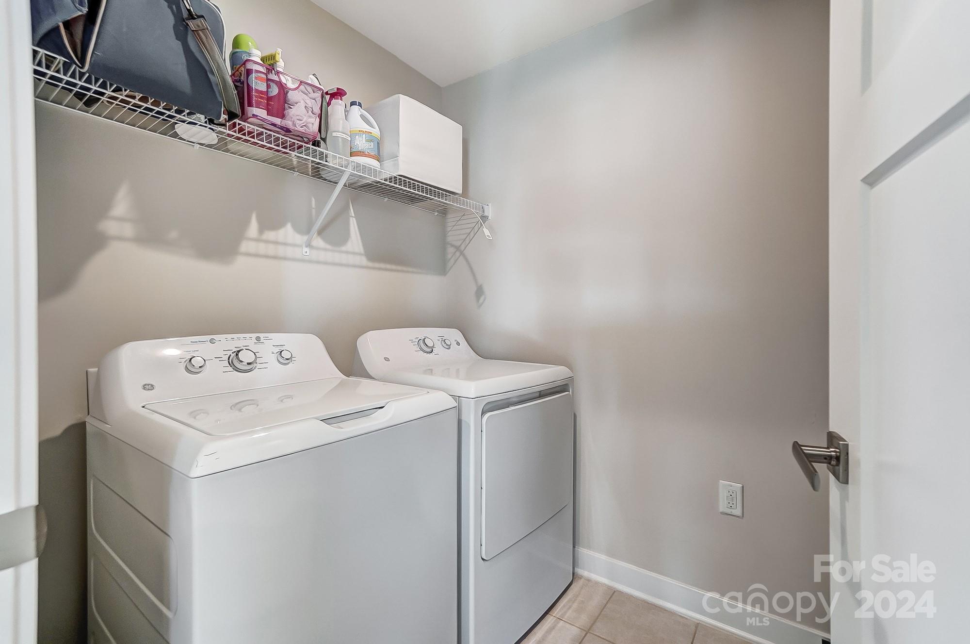 4136 Mackinnon Drive Charlotte, NC 28214 - Photo 39 of 48 a utility room with dryer and washer