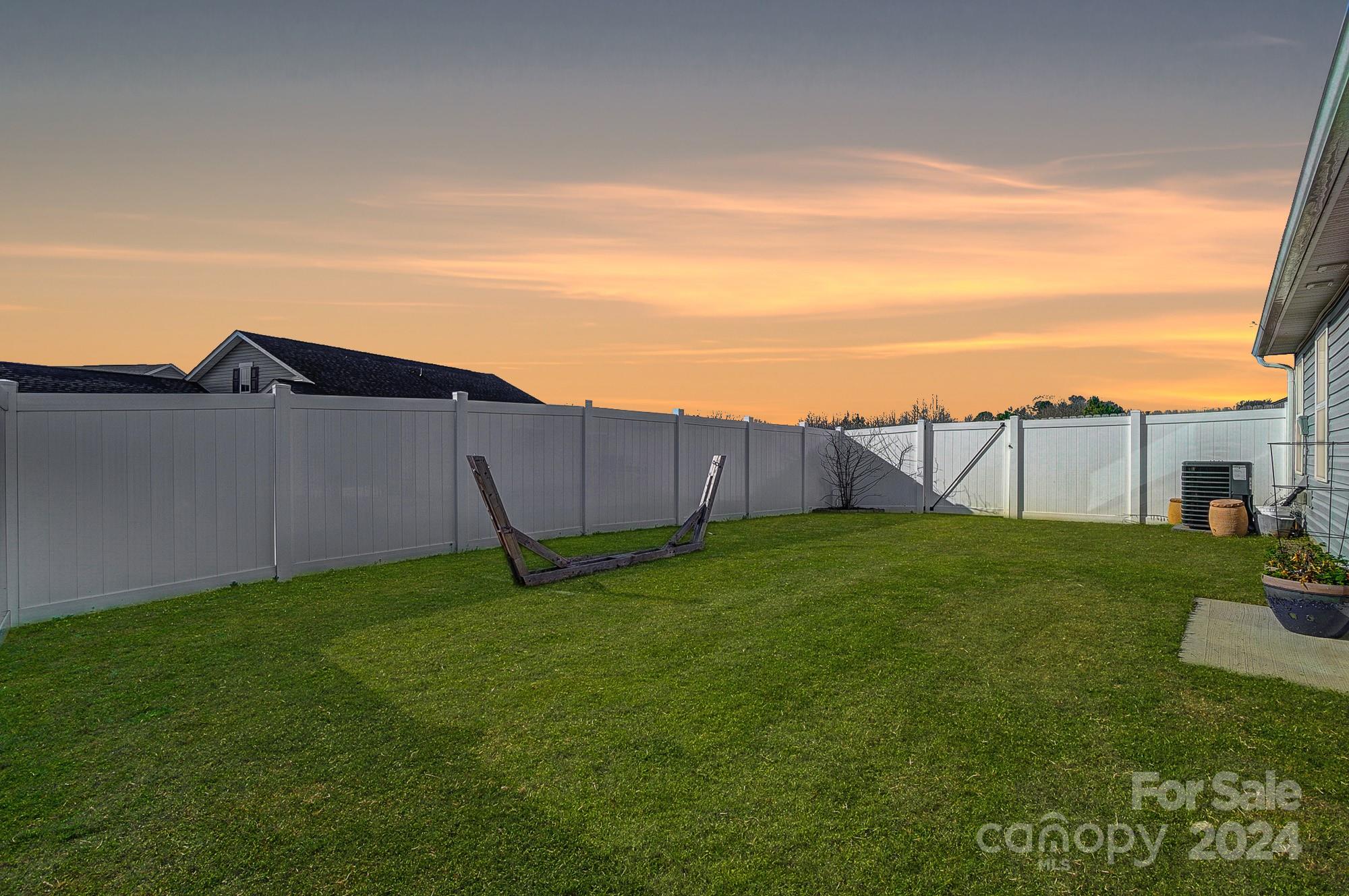 4136 Mackinnon Drive Charlotte, NC 28214 - Photo 41 of 48 a backyard of a house