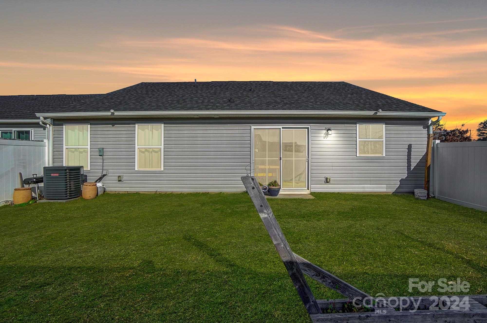 4136 Mackinnon Drive Charlotte, NC 28214 - Photo 48 of 48 a front view of a house with a yard