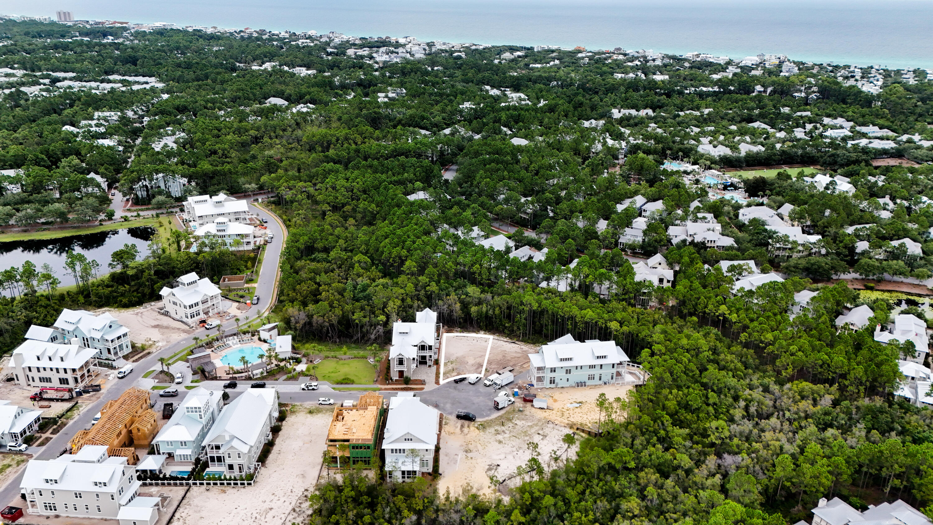 40 String Lily Cove Santa Rosa Beach, FL 32459 - Photo 10 of 14 an aerial view of a house with yard swimming pool and mountain view
