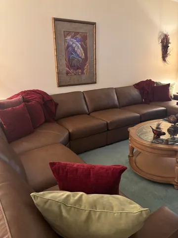 a living room with furniture and a couch