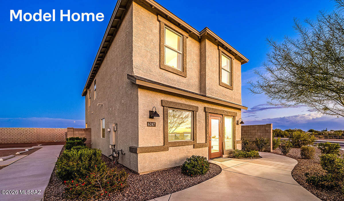 10498 West Rutherford Lane Marana, AZ 85653 - Photo 2 of 10 * Photos/Digital Renderings are of a Kate Model home and are for illustration purposes only. Photographs may show sales offices in model homes where garage location would be. Interior packages, exterior elevation, color, and structural options may vary. Home is under construction. Furnishings and decorative items not included with home purchase. *