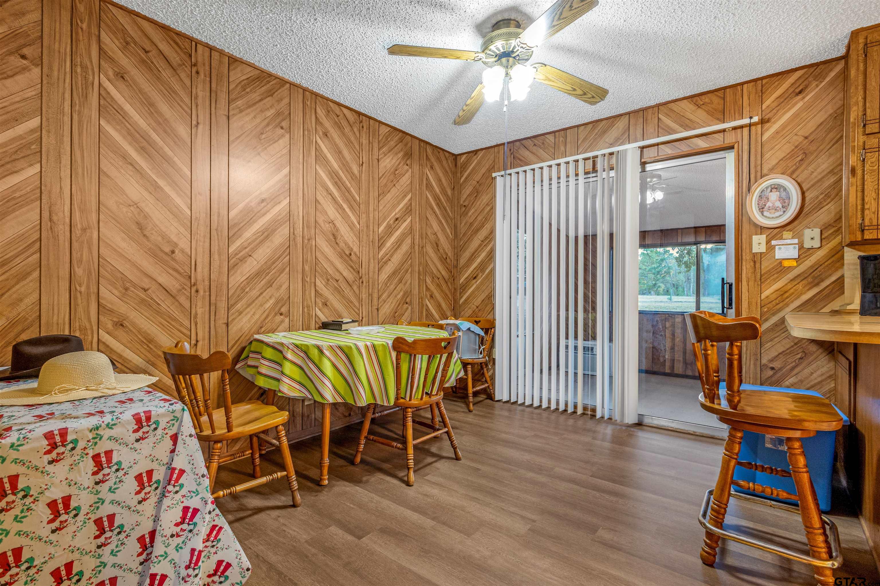3702 E Highway Quitman, TX 75783 - Photo 11 of 33 a view of a livingroom with furniture and front door
